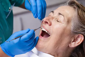 dental patient undergoing periodontal maintenance